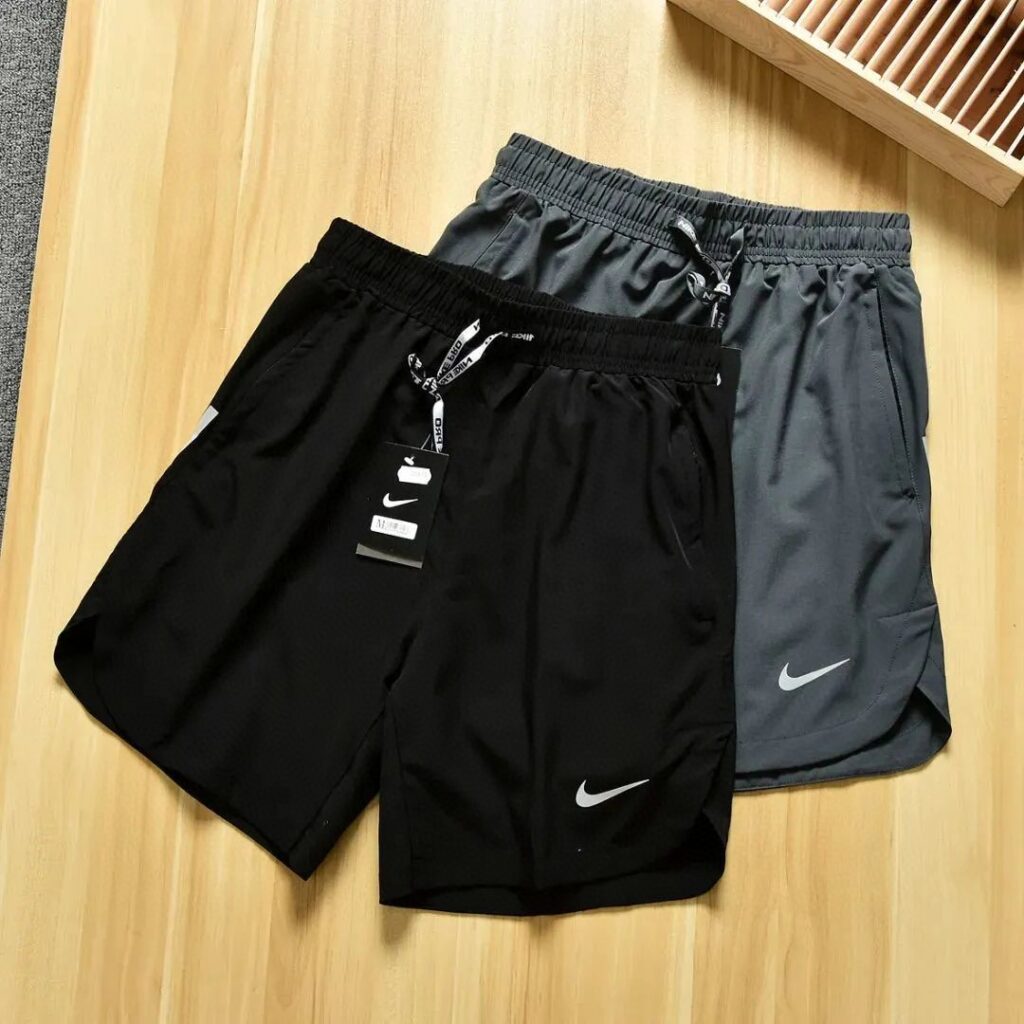Nike Men's Quick-Dry Running Shorts – Reflective Logo & Side Slits (Black/Grey) | Stretch Fabric & Hidden Zipper Pocket
